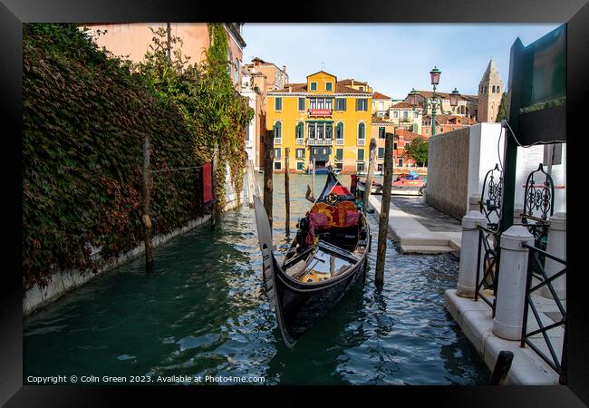Gondola Parked in Venice Framed Print by Colin Green