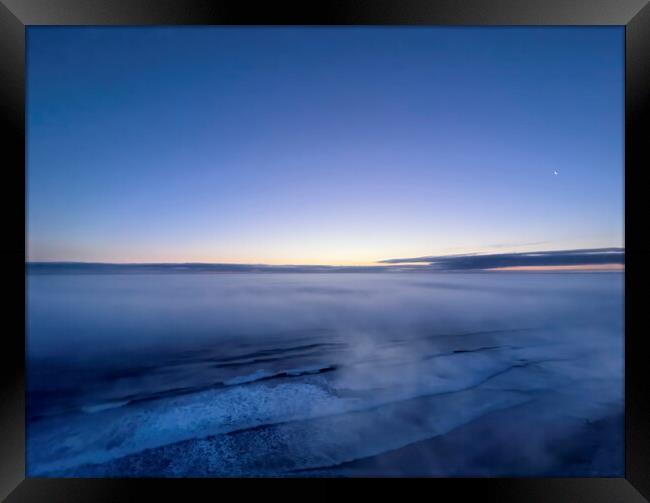 Morning sunrise on Atlantic Ocean with partial moon and star Framed Print by Thomas Baker