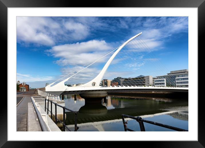 Modern cable bridge over the River Liffey in Irela Framed Mounted Print by Thomas Baker