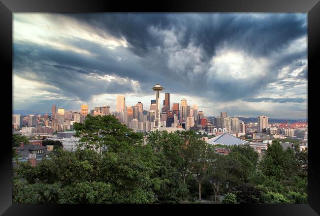 Skyline of Seattle Washington with storm approaching  Framed Print by Thomas Baker