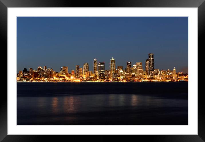 Skyline of Seattle Washington during night time  Framed Mounted Print by Thomas Baker