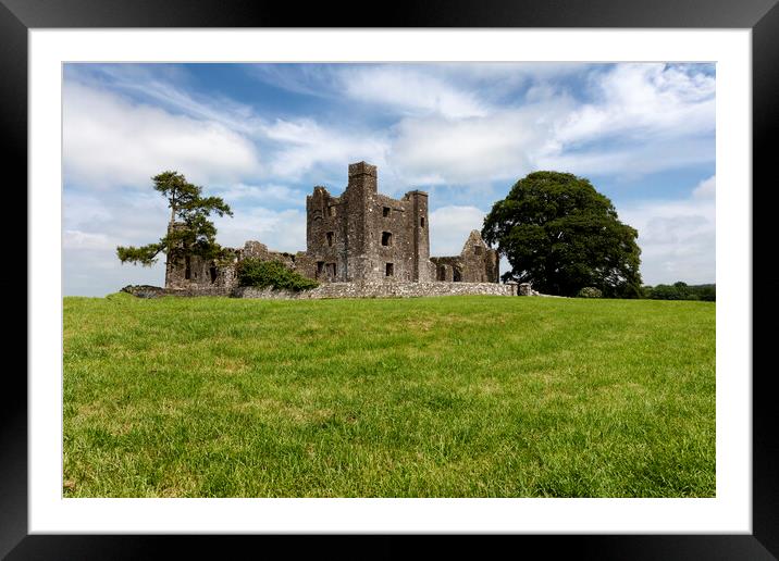 Old tiny castle in Ireland surrounded by grassy fields   Framed Mounted Print by Thomas Baker
