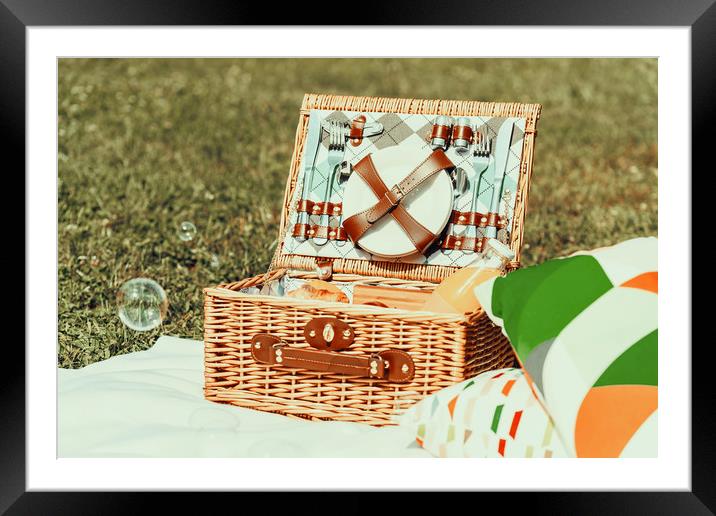 Picnic Basket Food On White Blanket With Pillows A Framed Mounted Print by Radu Bercan