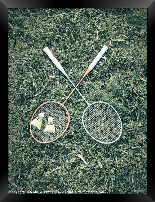 Badminton Racket And Shuttlecock Equipment In Gras Framed Print by Radu Bercan