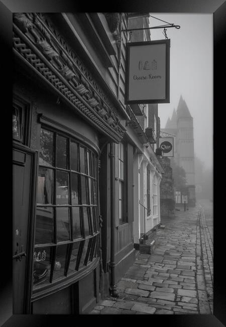 Urban Echoes: A Monochrome Narrative Framed Print by Rob Lucas