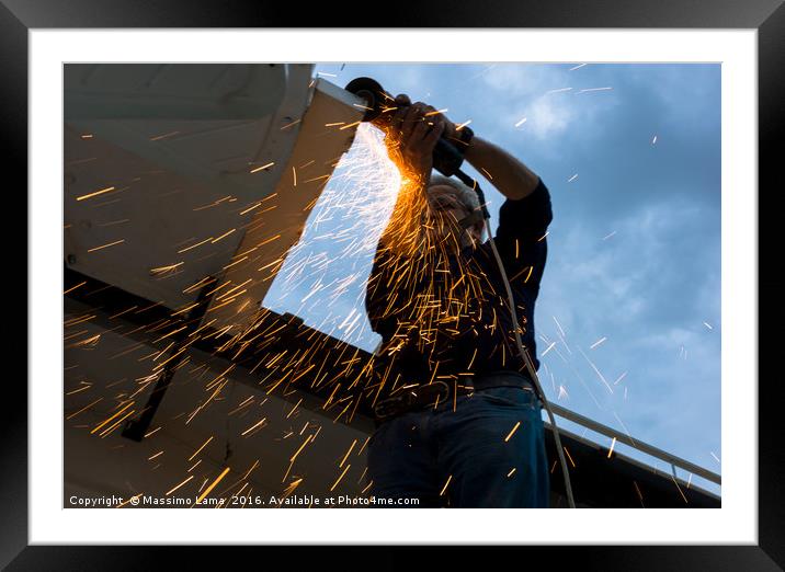 Muliple sparks during metal cutting Framed Mounted Print by Massimo Lama