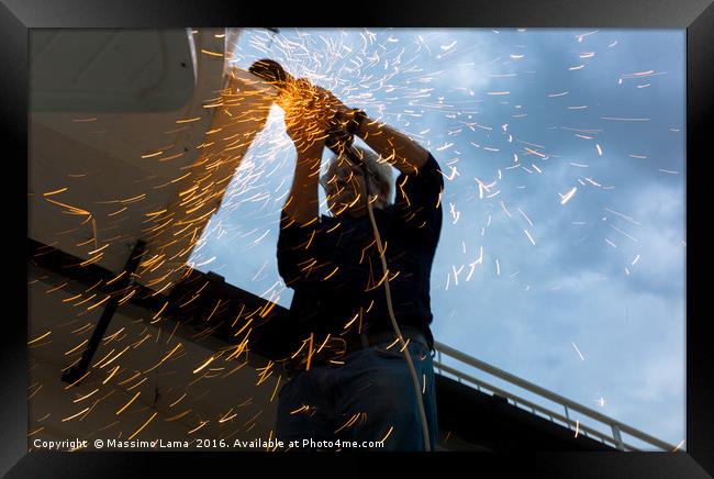 Muliple sparks during metal cutting Framed Print by Massimo Lama