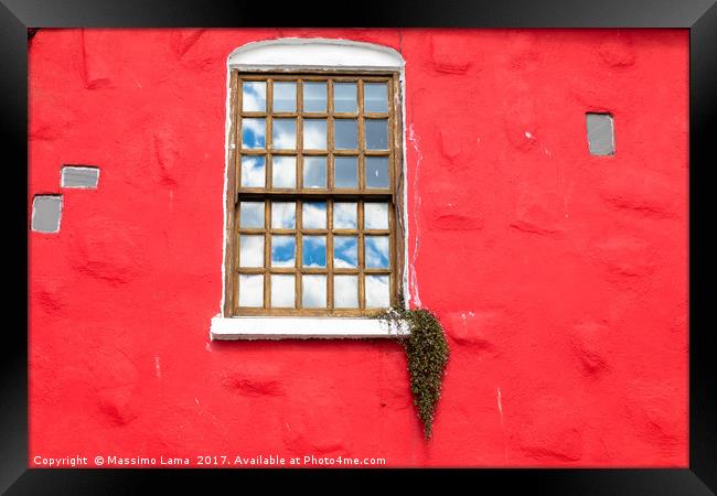 Window on red wall Framed Print by Massimo Lama