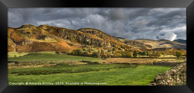 Sunlight On The Cumbrian Fells Framed Print by AMANDA AINSLEY