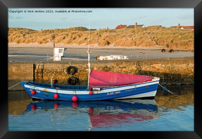 Fishing Coble moored in Beadnell Harbour Northumberland  Framed Print by Nick Jenkins