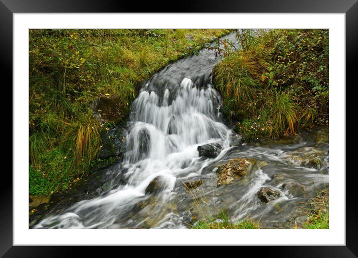 Narrow waterfall on stream taking water to Clydach Framed Mounted Print by Nick Jenkins