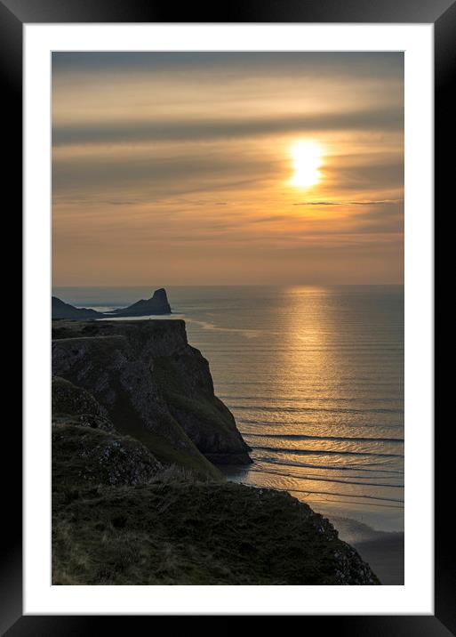 Sunset over the Worm's Head on the Gower Peninsula Framed Mounted Print by Nick Jenkins