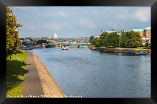 The River Trent at Nottingham showing boat and bri Framed Print by Nick Jenkins