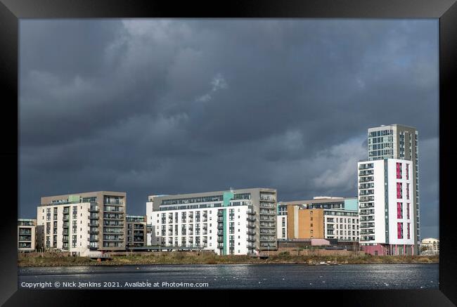 Cardiff Bay Apartments under late afternoon sunlig Framed Print by Nick Jenkins