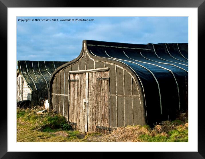 Upturned Herring Boats now used as sheds on Lindis Framed Mounted Print by Nick Jenkins