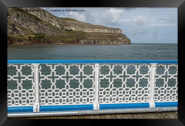 View of the Great Orme Llandudno from the pier  Framed Print by Nick Jenkins