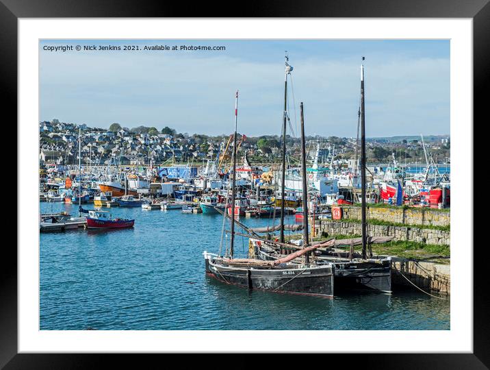Newlyn Harbour with boats of all shapes and sizes  Framed Mounted Print by Nick Jenkins