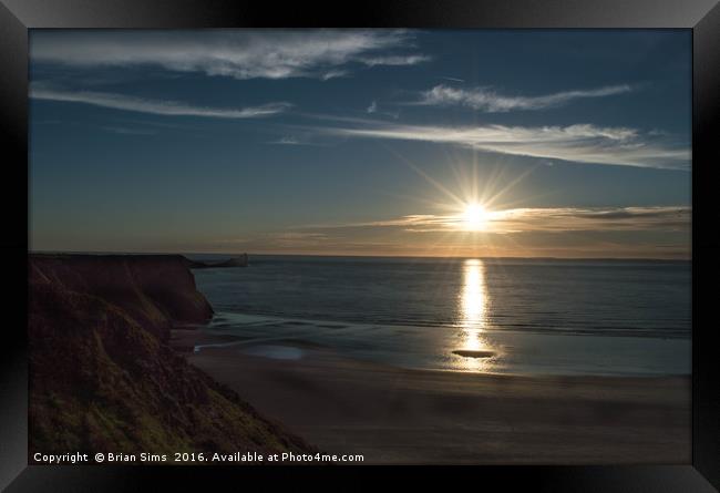 Sunset over Rhossili bay Framed Print by Brian Sims