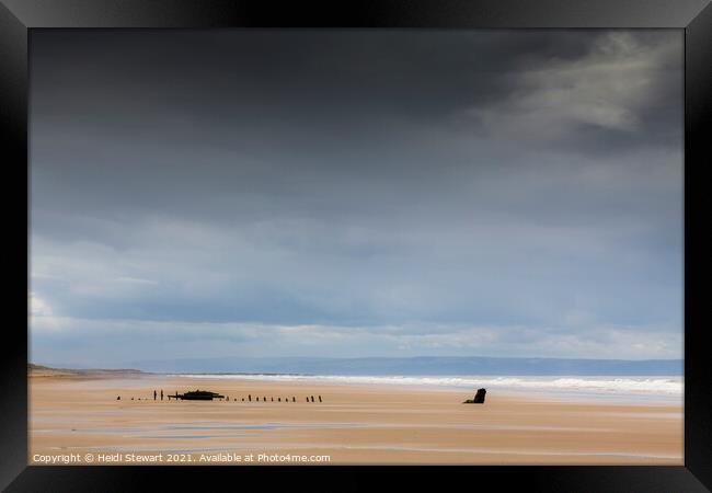 Sker Beach Wreck, near Porthcawl in South Wales.  Framed Print by Heidi Stewart