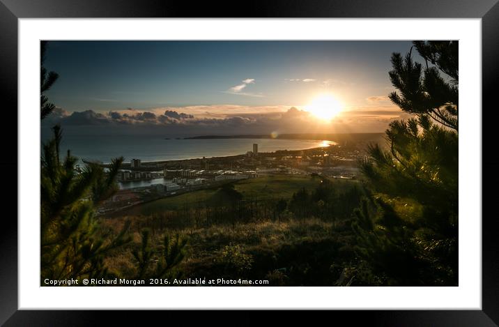 Setting sun over Swansea. Framed Mounted Print by Richard Morgan