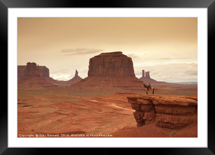 Lone Horseman Overlooks Monument Valley Framed Mounted Print by Toby Bennett