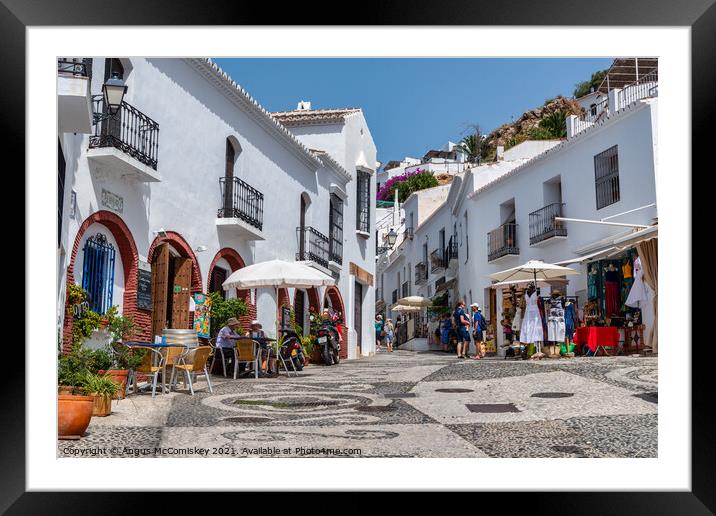 Tourists in Frigiliana in Andalusia, Spain Framed Mounted Print by Angus McComiskey