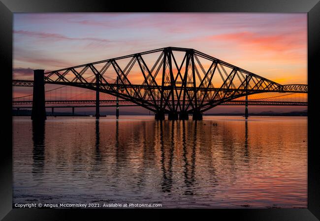 Paddle boarders under the Forth Rail Bridge Framed Print by Angus McComiskey