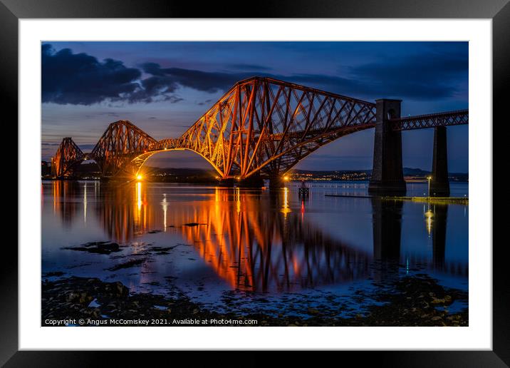 Floodlit Forth Rail Bridge at dusk Framed Mounted Print by Angus McComiskey