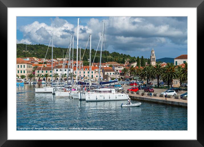Yachts moored in Vela Luka harbour, Croatia Framed Mounted Print by Angus McComiskey