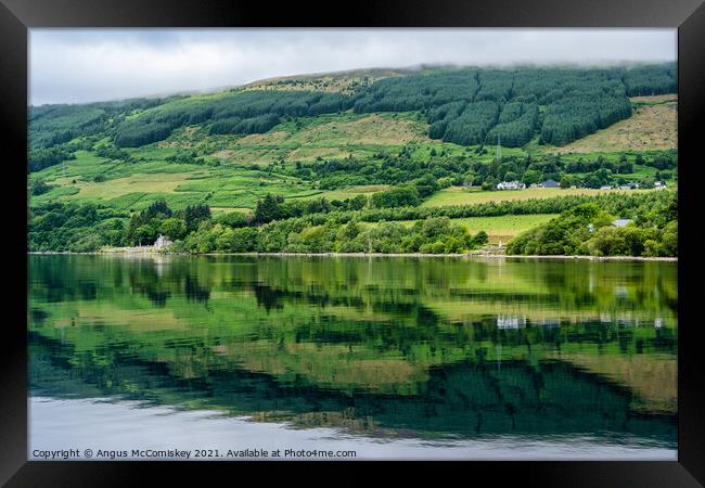 Reflections on Loch Tay, Perthshire Framed Print by Angus McComiskey