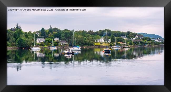 Yachts anchored at North Connel village Framed Print by Angus McComiskey