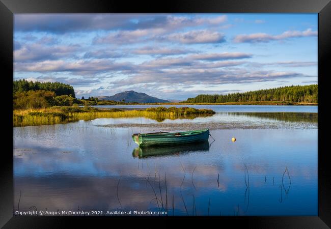 Fisherman’s boat on Loch Peallach, Isle of Mull Framed Print by Angus McComiskey