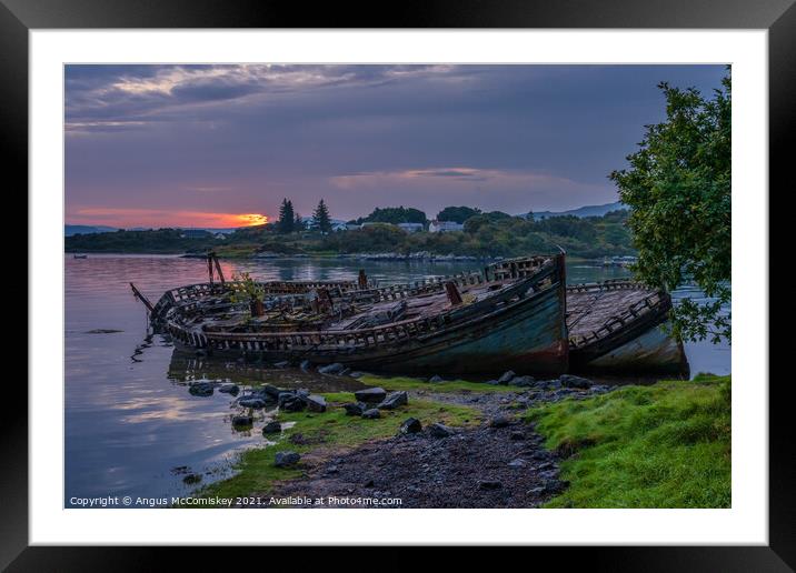 Abandoned fishing boats at Salen Bay at daybreak Framed Mounted Print by Angus McComiskey