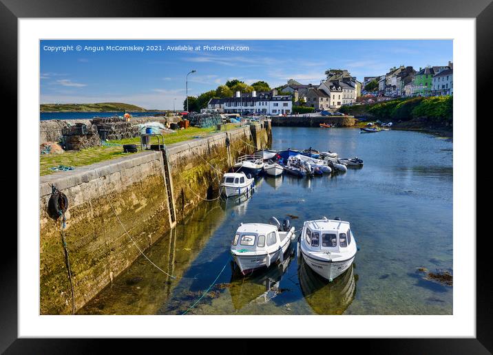 Boats tied up in Roundstone harbour, County Galway Framed Mounted Print by Angus McComiskey
