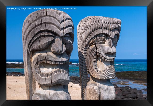 Wooden Ki'i statues on Big Island, Hawaii Framed Print by Angus McComiskey