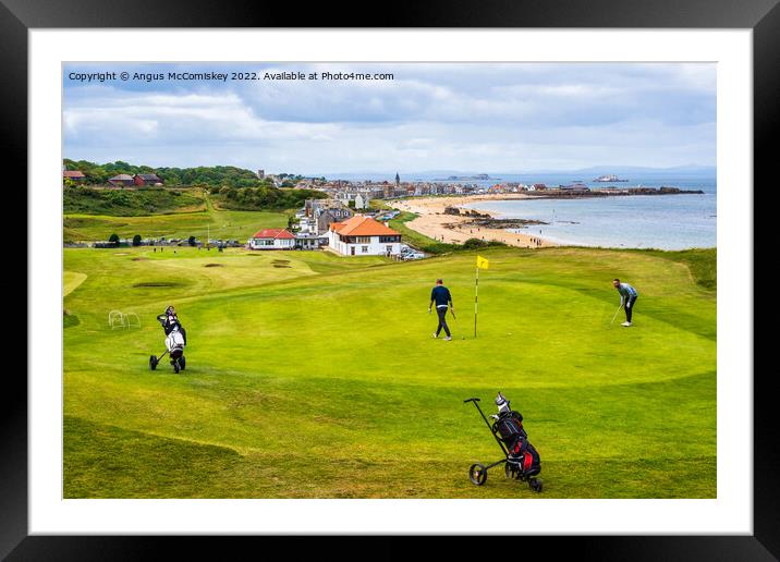 Golfers on green at Glen Golf Course North Berwick Framed Mounted Print by Angus McComiskey