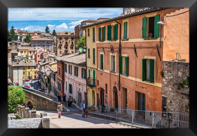 Colourful buildings beside the aqueduct in Perugia Framed Print by Angus McComiskey