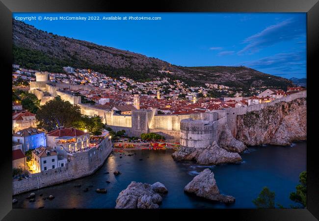 Old walled city of Dubrovnik at dusk, Croatia Framed Print by Angus McComiskey