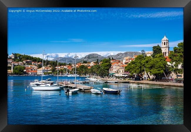 Boats moored in Cavtat harbour in Croatia Framed Print by Angus McComiskey