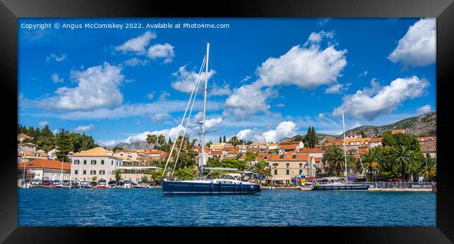 Yachts anchored on Cavtat waterfront in Croatia Framed Print by Angus McComiskey