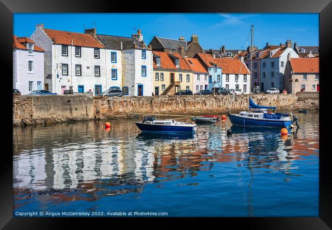 Colourful reflections in St Monans harbour Framed Print by Angus McComiskey