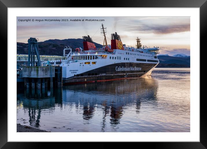 CalMac ferry in Ullapool harbour Framed Mounted Print by Angus McComiskey