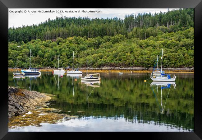 Moored yachts at Salen Jetty, Ardnamurchan Framed Print by Angus McComiskey