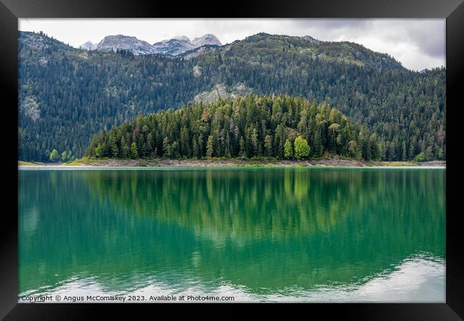 Reflections in The Black Lake, Montenegro Framed Print by Angus McComiskey