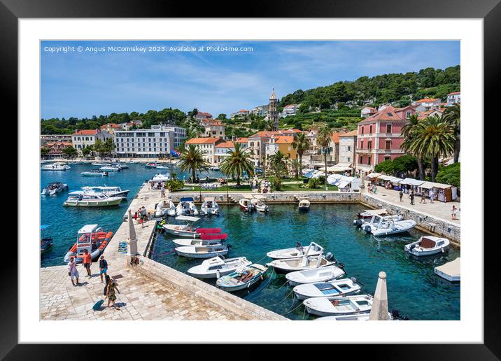 Waterfront of Hvar town, Croatia Framed Mounted Print by Angus McComiskey