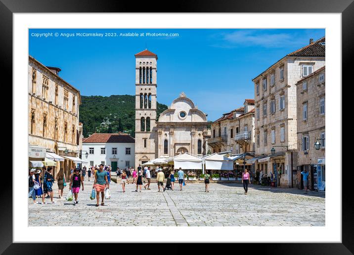 St Stephen’s Square in Hvar town, Croatia Framed Mounted Print by Angus McComiskey