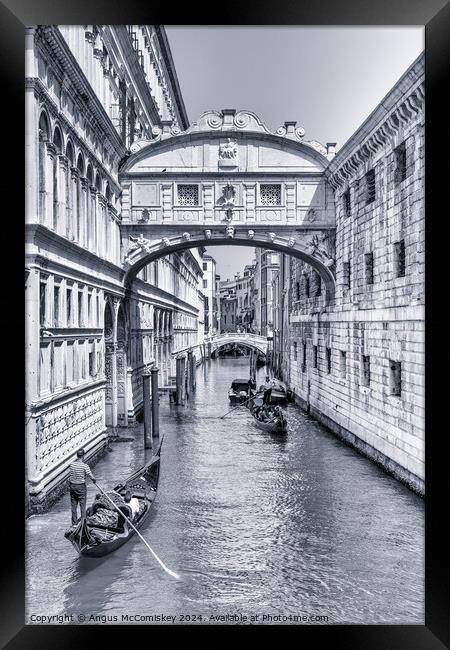 Gondolas under the Bridge of Sighs in Venice (B&W) Framed Print by Angus McComiskey