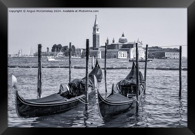 Gondolas on waterfront promenade in Venice (B&W) Framed Print by Angus McComiskey