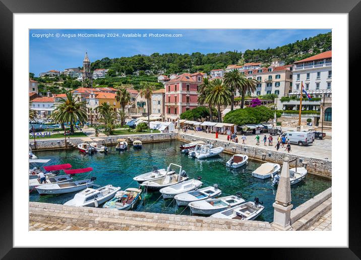 Waterfront of Hvar town, Croatia Framed Mounted Print by Angus McComiskey
