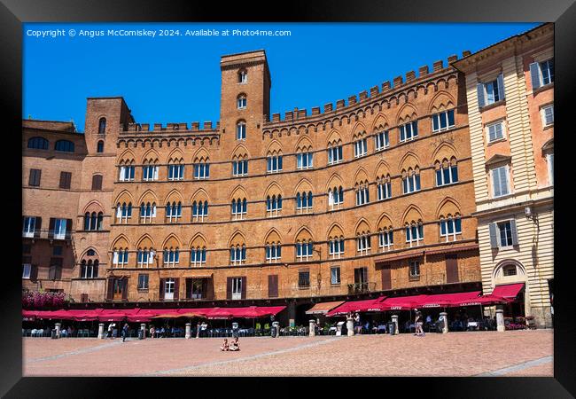 Medieval buildings in Piazza del Campo in Siena Framed Print by Angus McComiskey